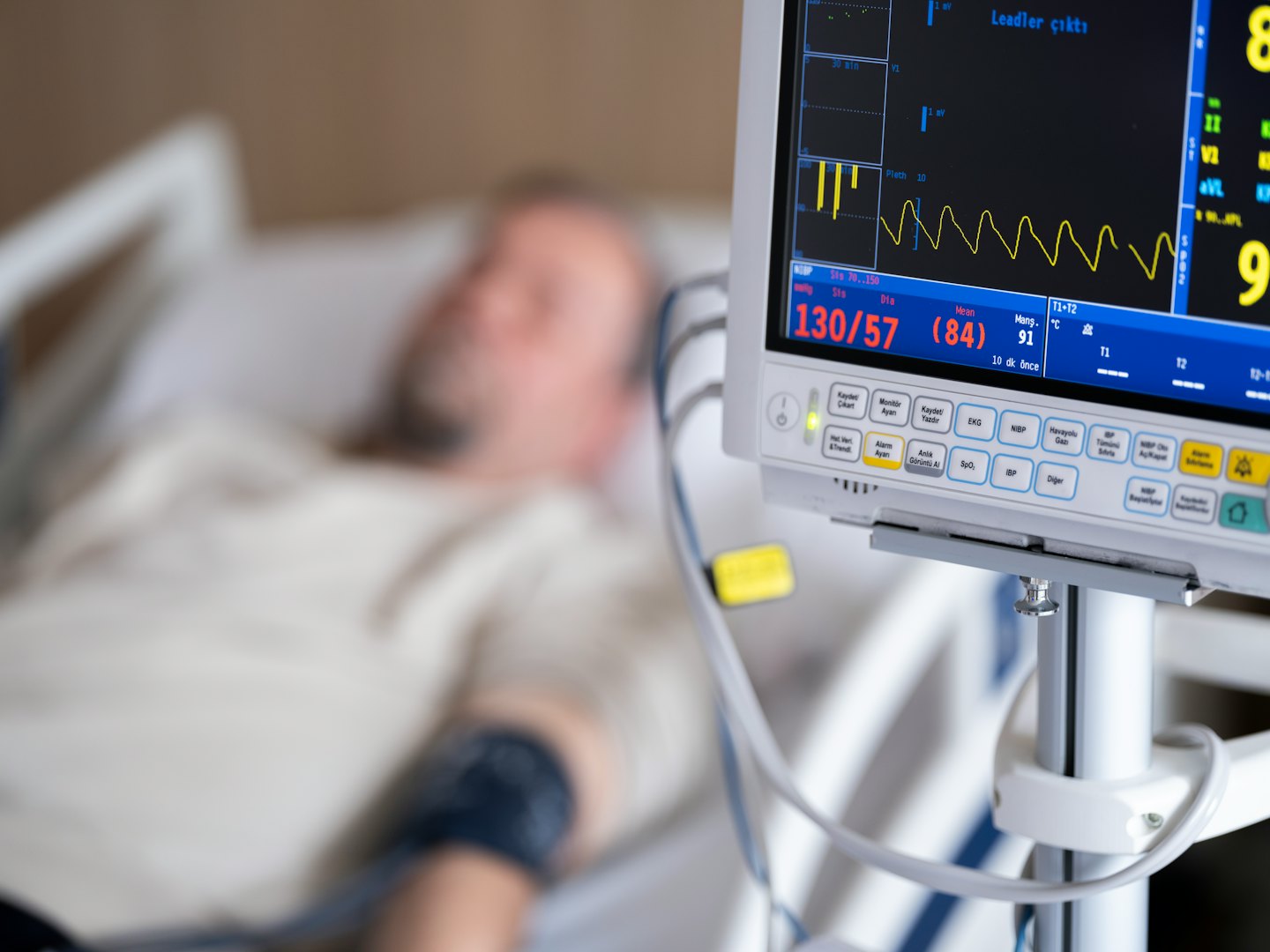Hospital vital signs monitor displaying patient readings.